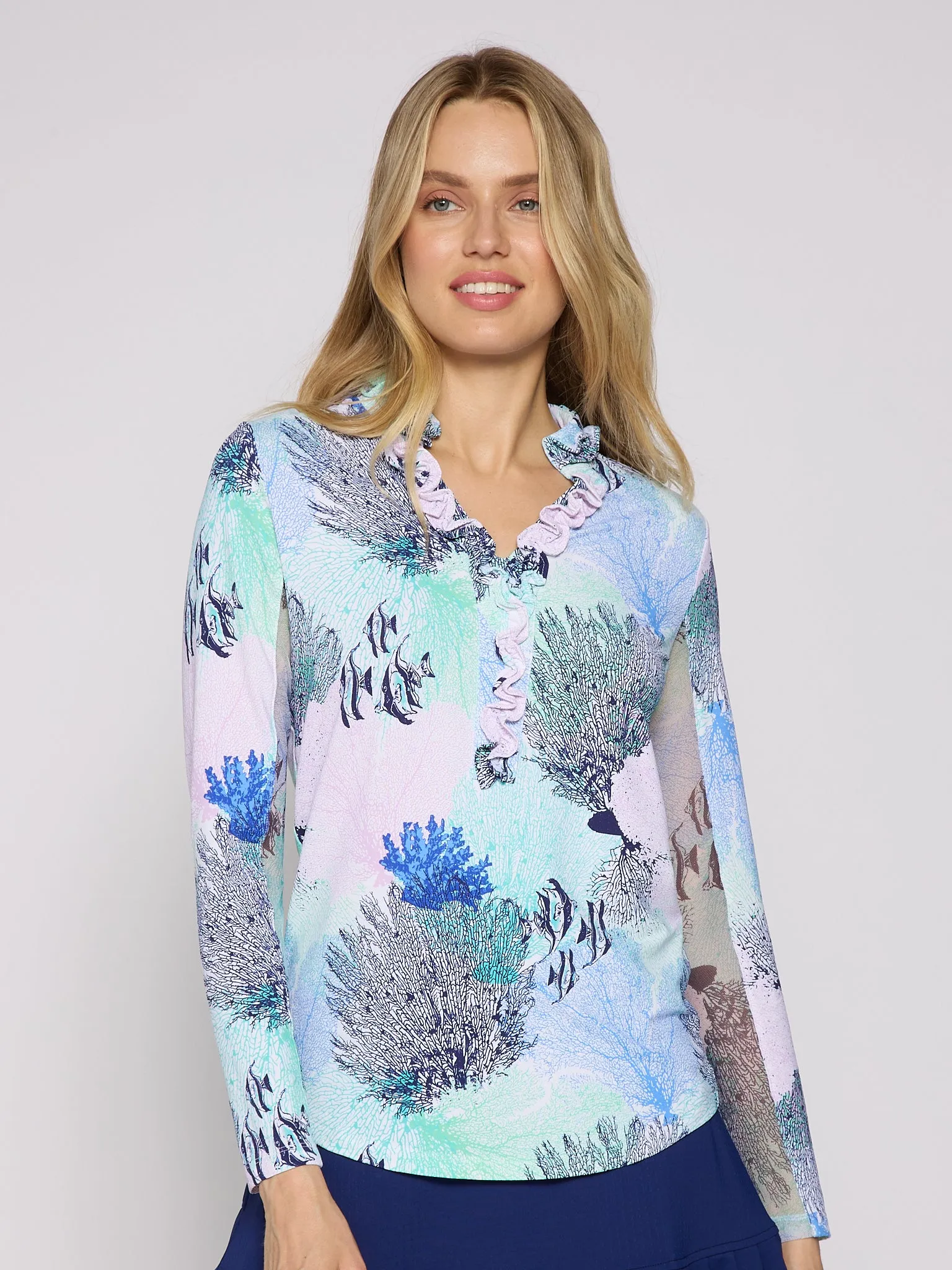 OdorResistant Treatment MinimalistDesign UPF 50  Ruffle V Neck Top In Blue Coral