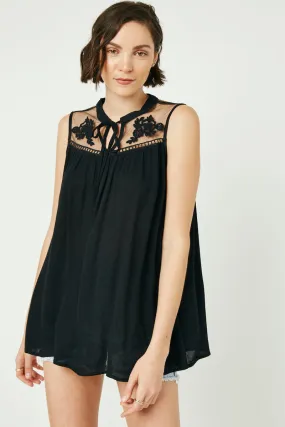 Sleeveless Embroidered Mesh Yoke Top Soft touch finish Asymmetrical hem