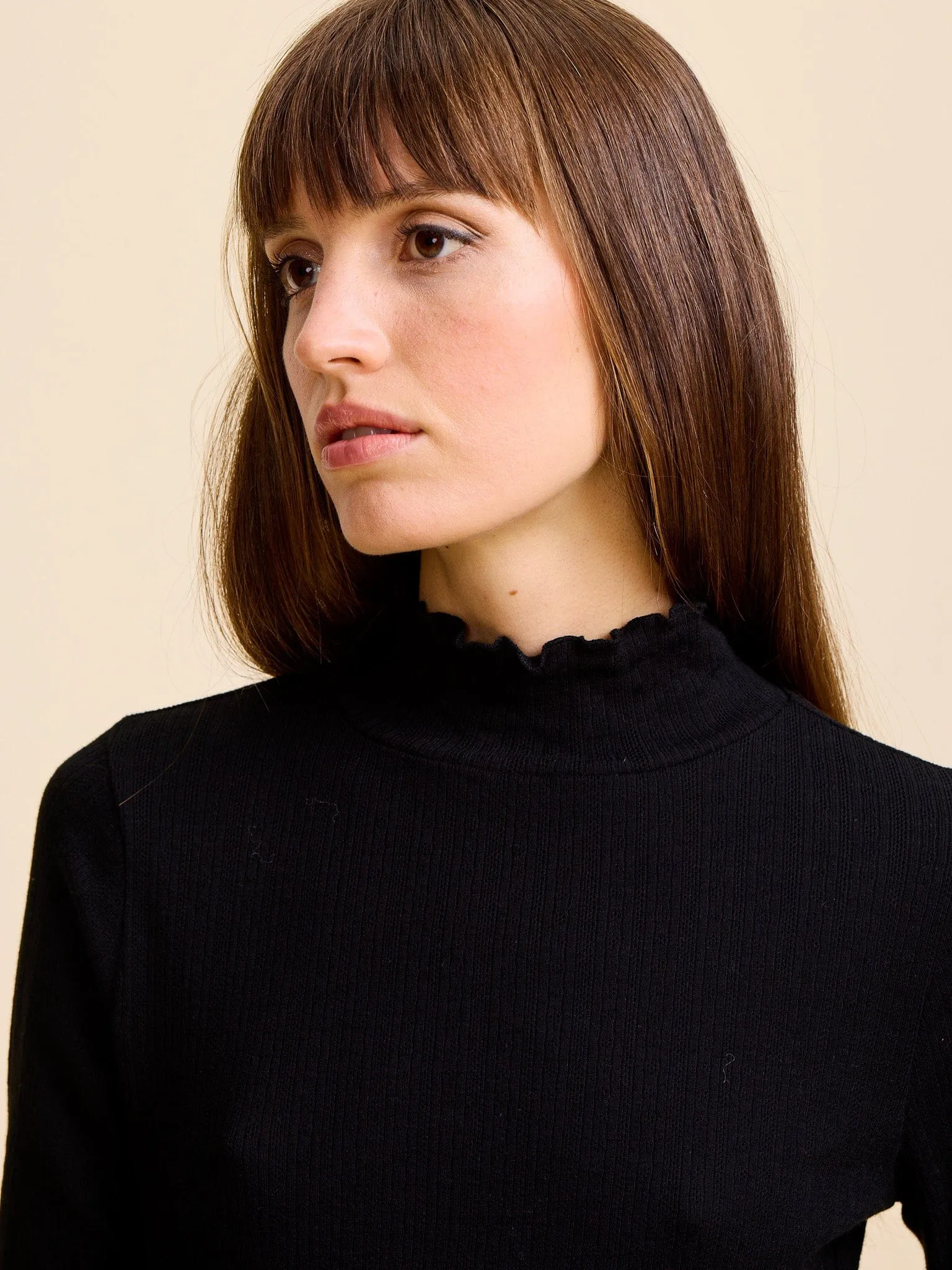 Carmela Pointelle Turtleneck in Black Anti Pilling Treatment