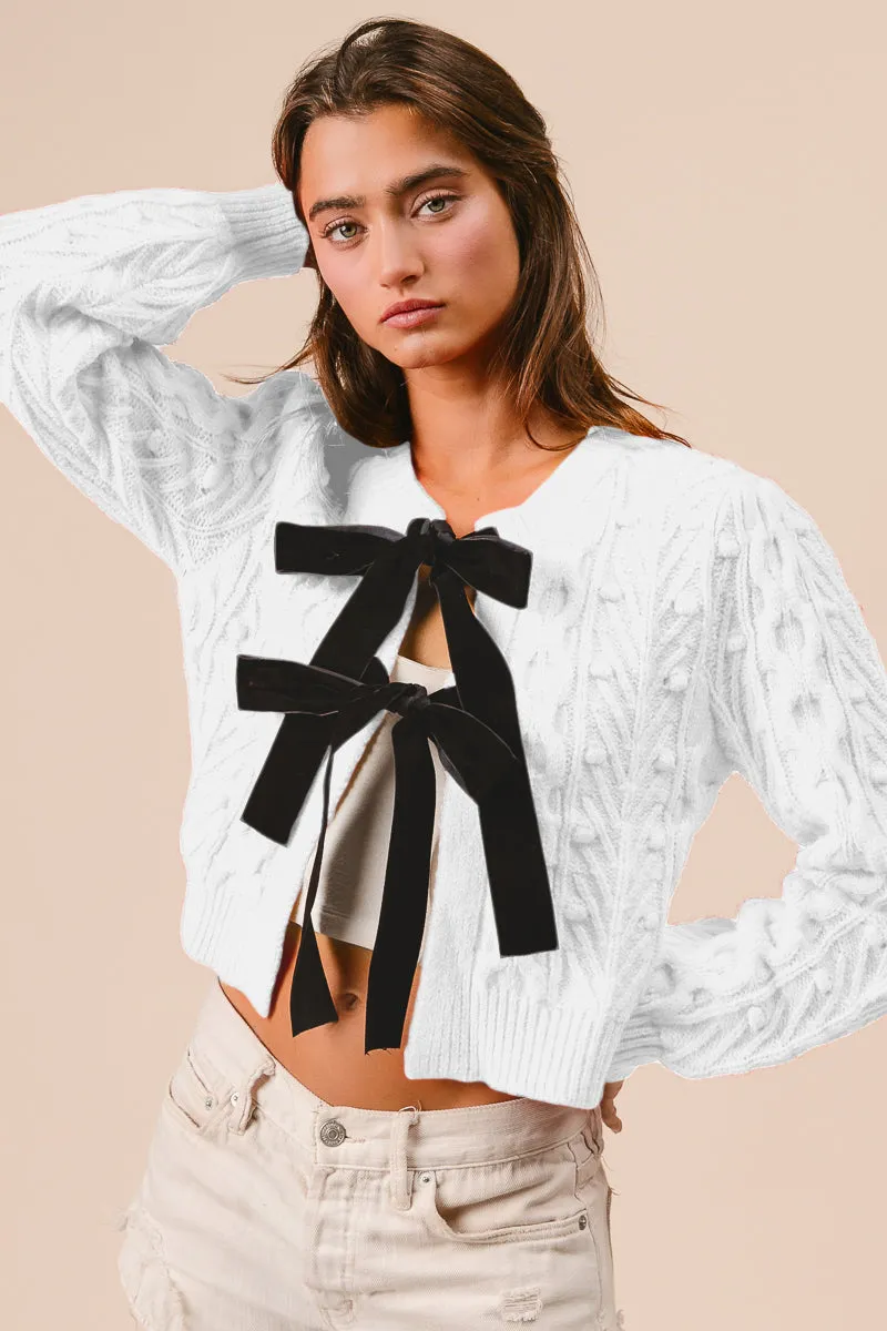 Gloss Free Texture Breathable fabric tech IT3146-01 | CABLE KNIT WITH CONTRAST BOW DETAIL TOP