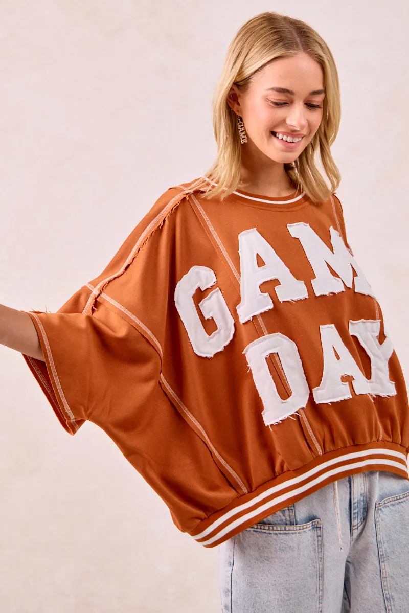 IT3796G-15 | GAMEDAY PATCHWORK STITCH DETAIL FRENCH TERRY TOP Adjustable Hemline Cool Climate