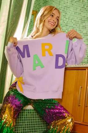 Softened Hem IT3797G-07 | LETTER PATCHES AND SIDE BOW MARDI GRAS SWEATSHIRT