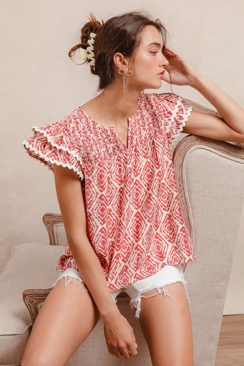 IT3883-01 | PRINTED WITH SMOCKING DETAILS AND WAVY TRIM SHORT SLEEVES TOP Airtight Fasteners