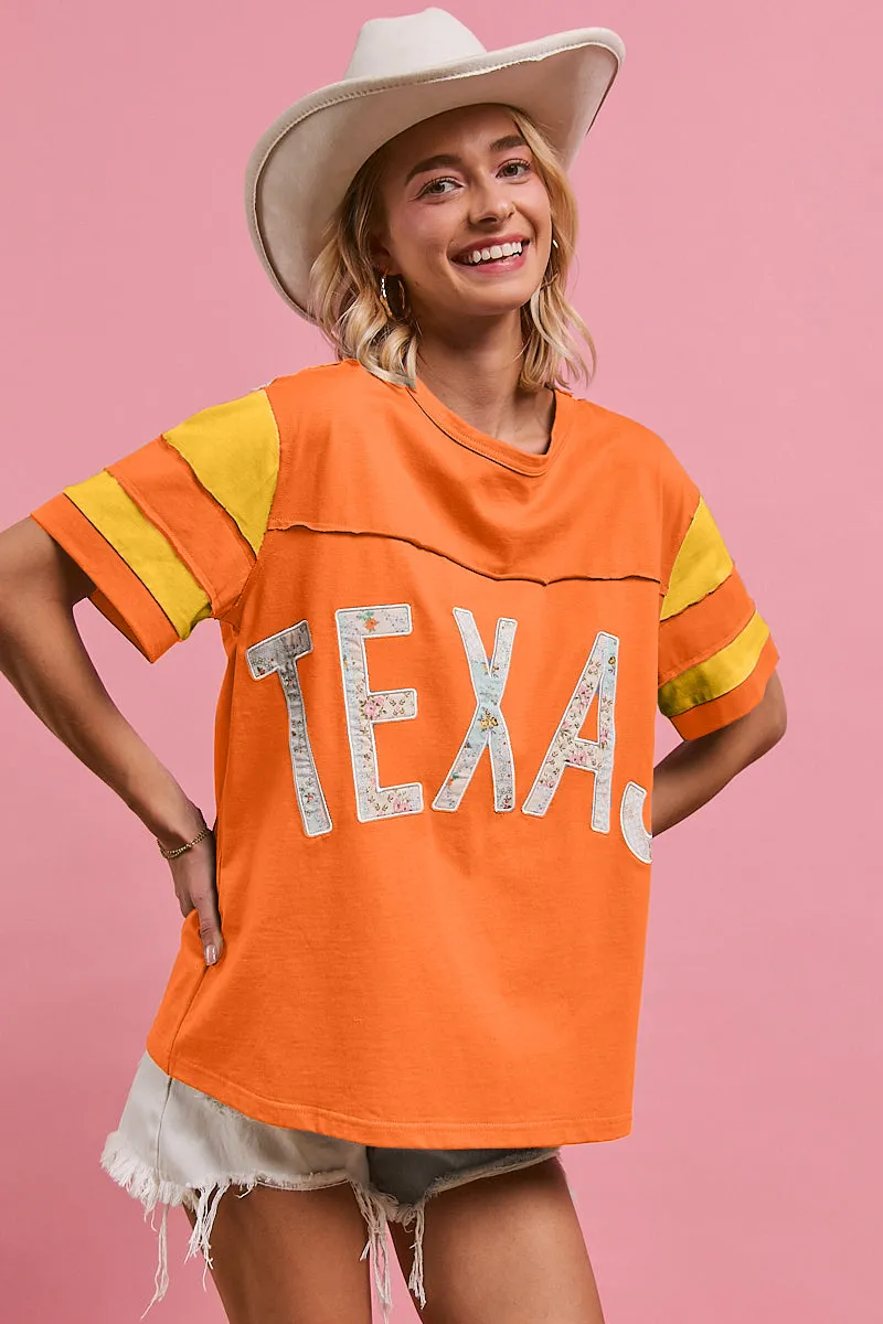 Seamless Design Temperature control IT4260-01 | FLORAL PRINT MIX AND MATCH WITH TEXAS LETTERING SHORT SLEEVES TOP