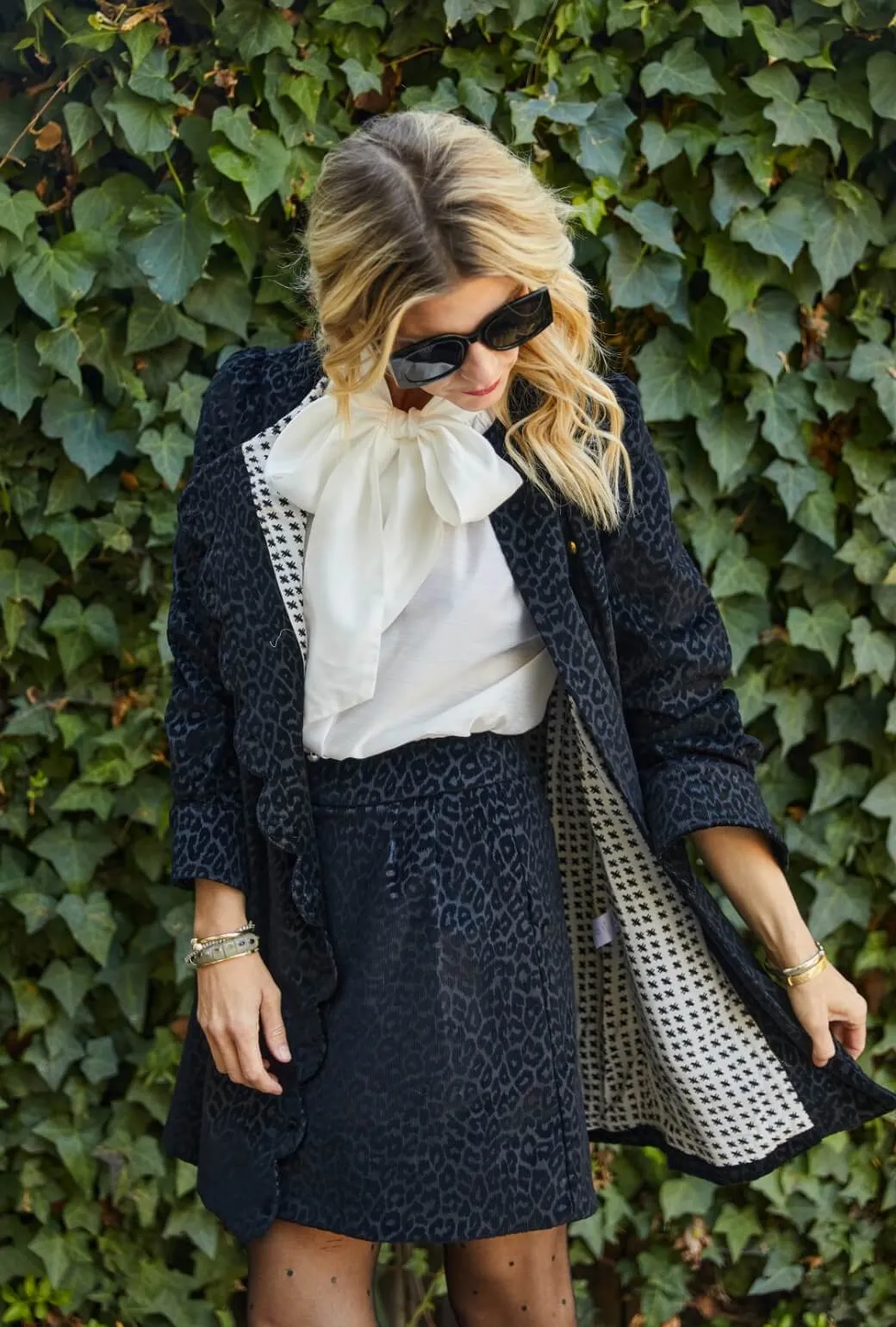 Maggie Mini Skirt - Black Cheetah Corduroy Water Resistant Finish Quick Access Pockets