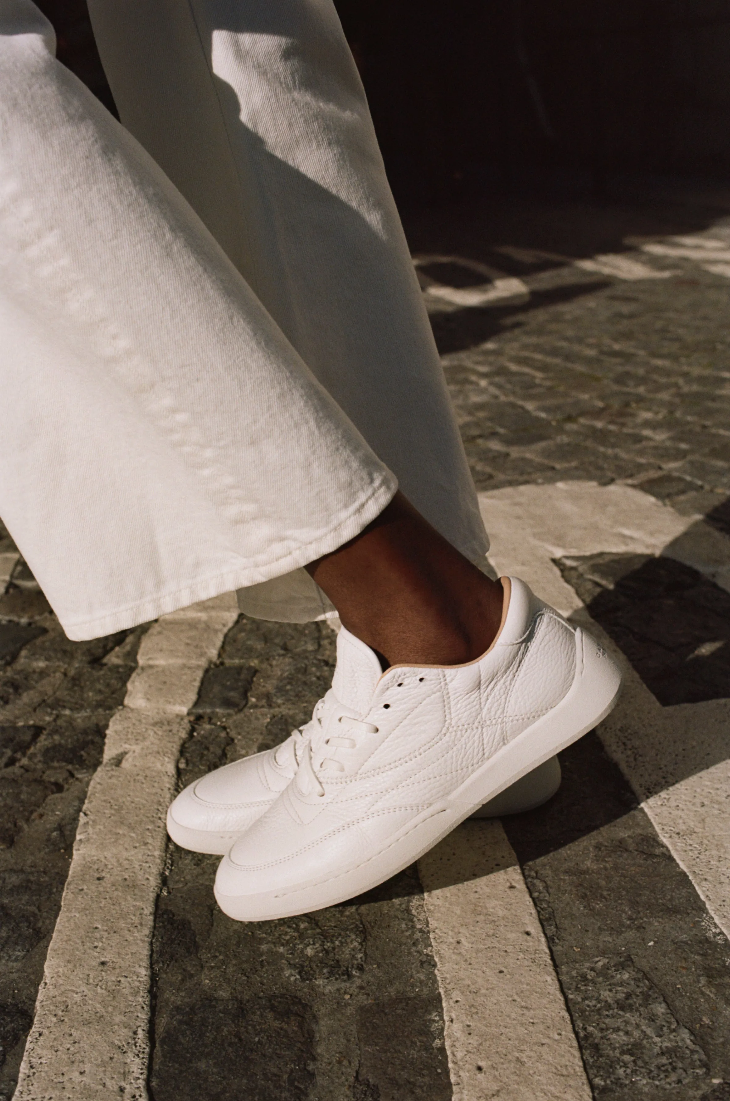Ohio Slip-on Sneaker in White Textured Leather Reflective Trim Details Office Attire