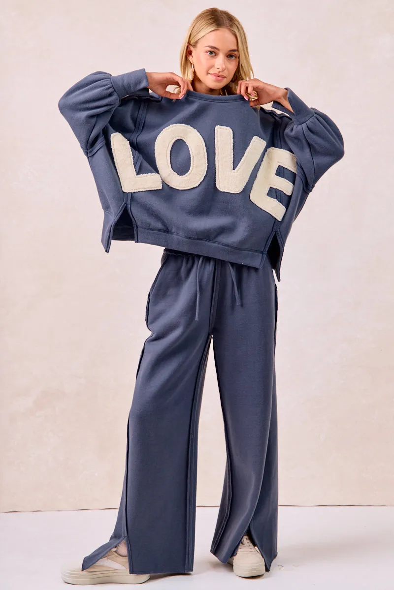 IB1840K-01 | SOLID FRENCH TERRY PANTS WITH CUT EDGE DETAILS Durable Hem