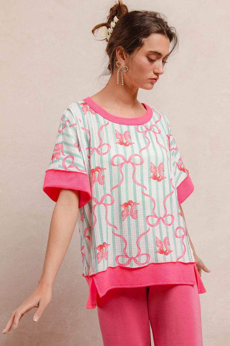 Ergonomic Shoulder Fit IT4173R-01M | BOW RIBBON PRINTED LOOSE FIT TOP WITH CONTRAST BAND